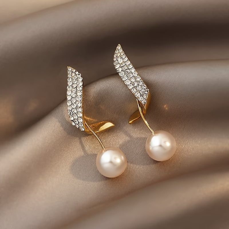 Boucles d'oreilles plumes et perles en cristal