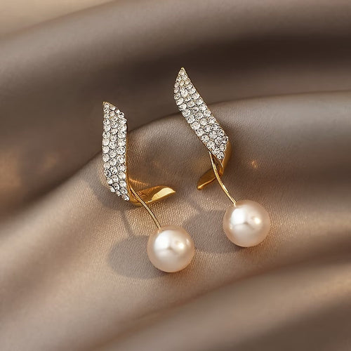 Boucles d'oreilles plumes et perles en cristal