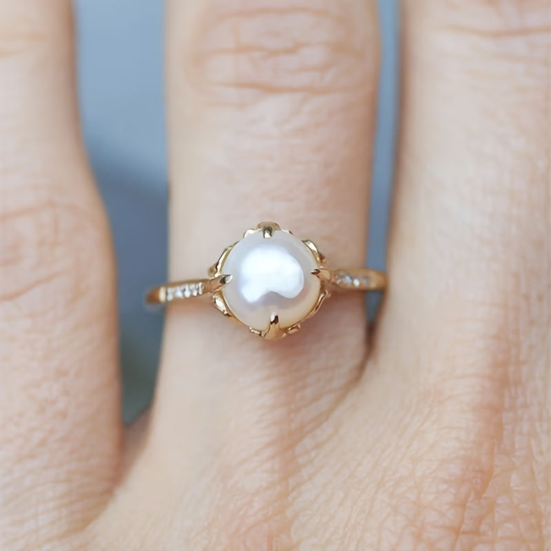 Bague en perles et cristaux délicate