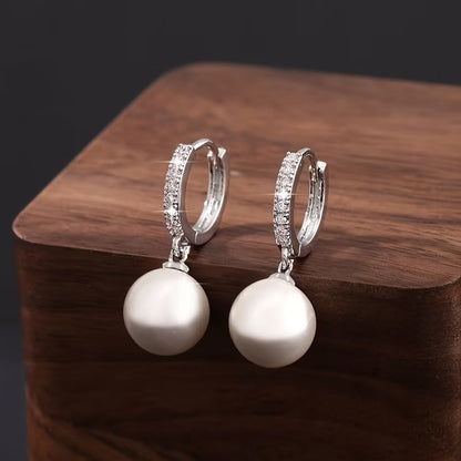 Boucles d'oreilles pendantes géométriques en perles