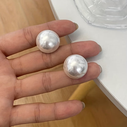 Boucles d'oreilles clous en perles audacieuses
