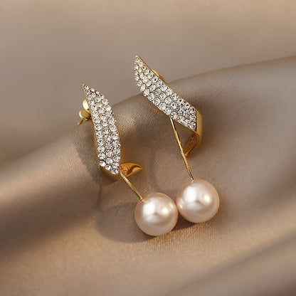 Boucles d'oreilles plumes et perles en cristal
