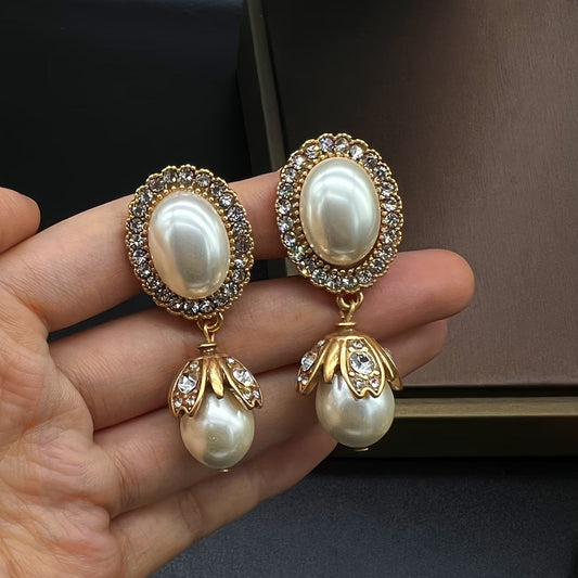 Boucles d'oreilles pendantes vintage en perles encadrées